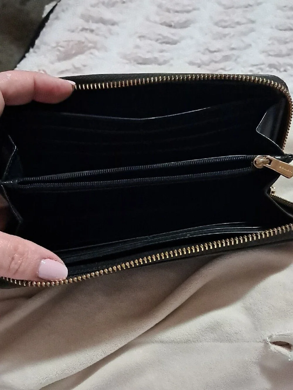 Coach Black Zip-Around Wallet with Gold Logo Accent